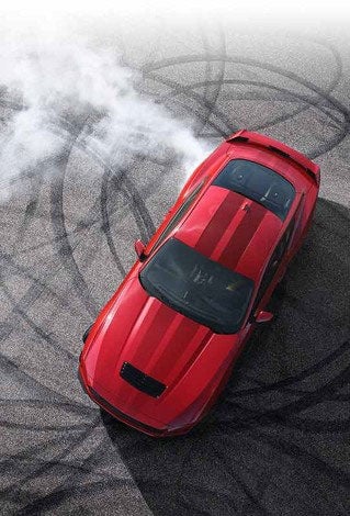 Overhead view of a 2024 Ford Mustang® model with tire tracks on pavement | V & H Ford of Marshfield in Marshfield WI